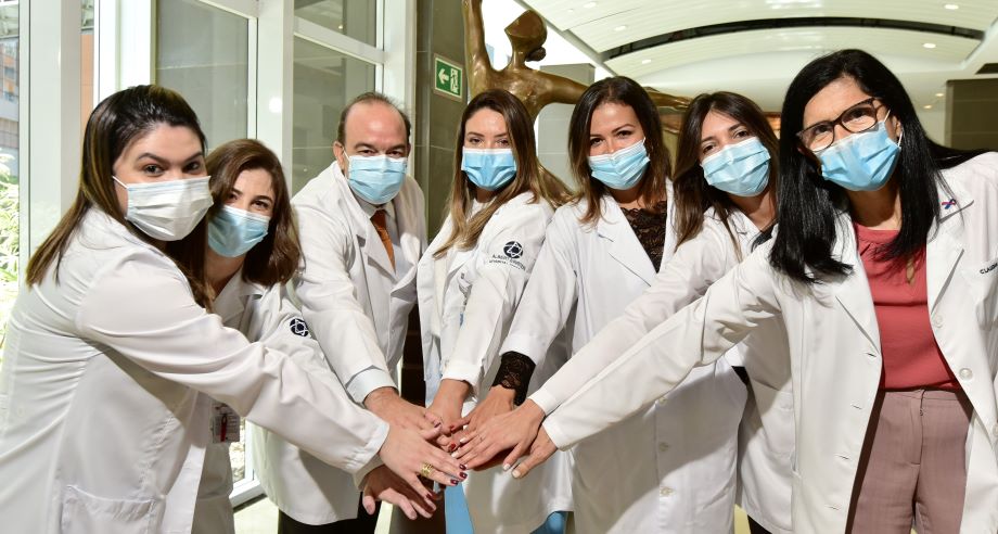 Brazil hands in masks inside image